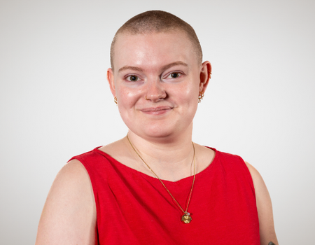 Picture of Aubrey Kelly wearing a red shirt.